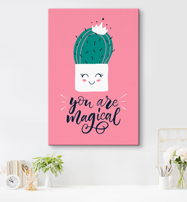 A cactus in a pot with a face and a quote A cactus in a pot with a face and a quote