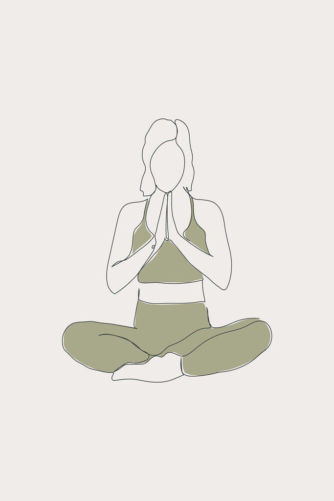 A woman sitting cross legged with her hands together