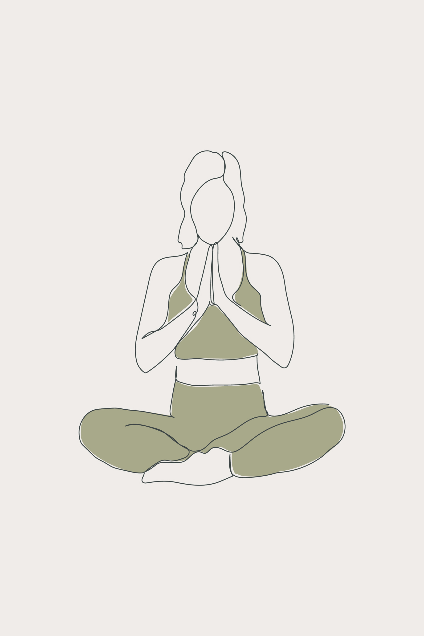 A woman sitting cross legged with her hands together