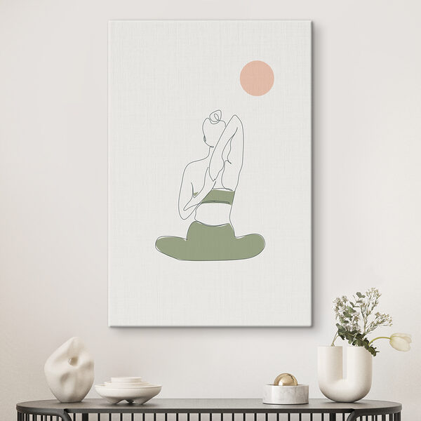 A woman sitting in yoga pose