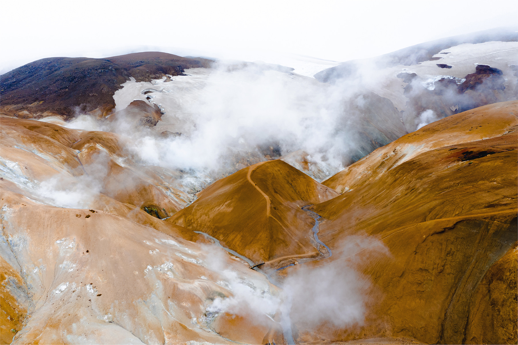 A mountain with steam coming out of it A mountain with steam coming out of it