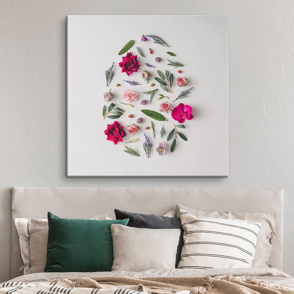 A group of flowers arranged in an egg shape A group of flowers arranged in an egg shape