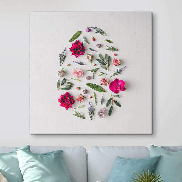 A group of flowers arranged in an egg shape A group of flowers arranged in an egg shape