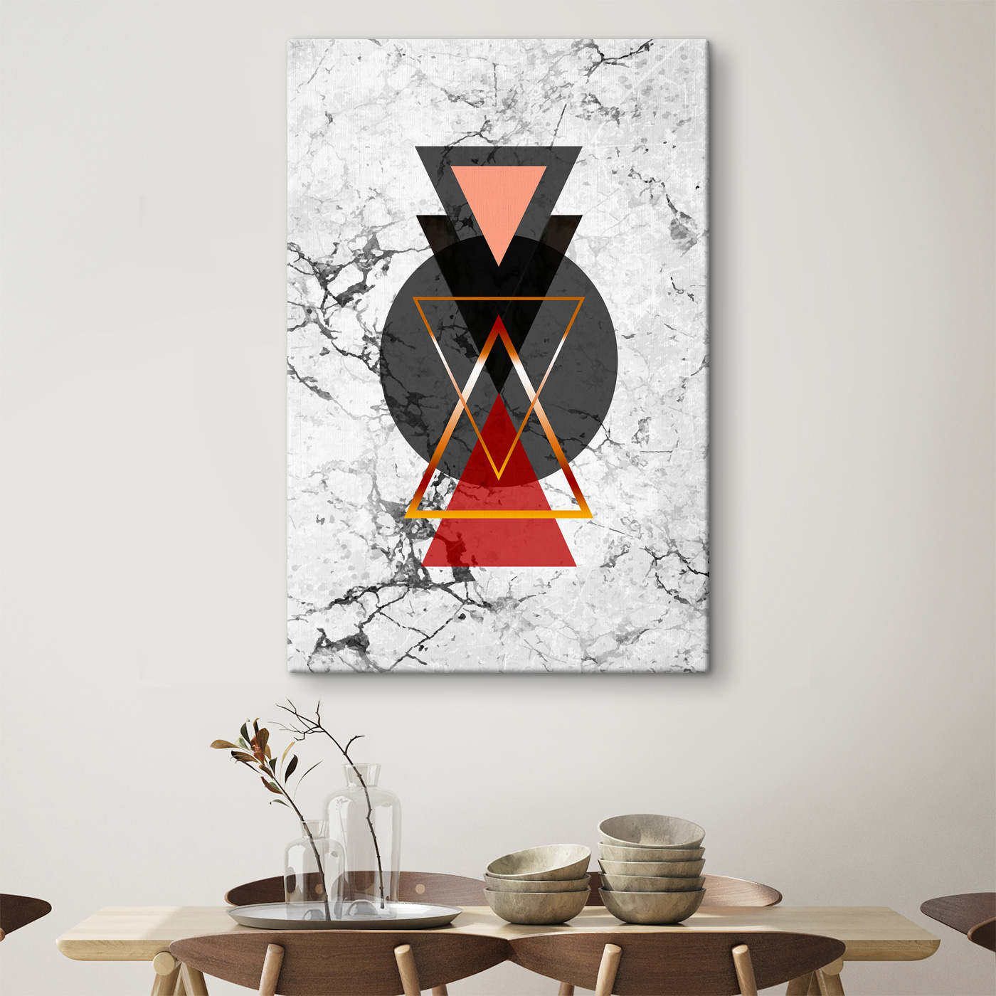 A black and red triangle and circle on a marble surface A black and red triangle and circle on a marble surface