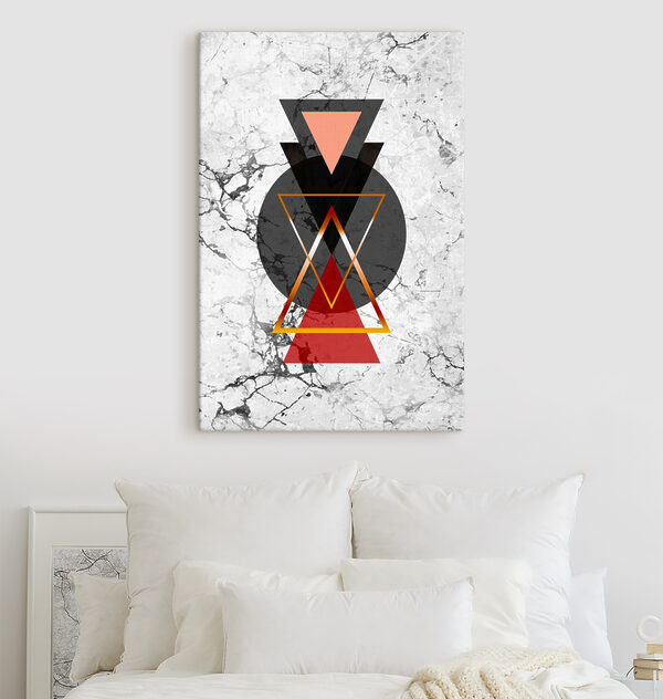 A black and red triangle and circle on a marble surface A black and red triangle and circle on a marble surface