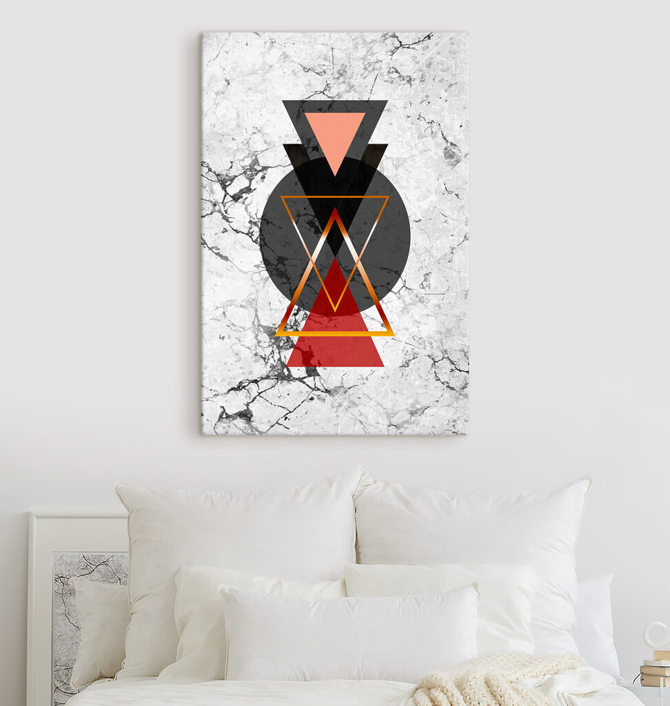 A black and red triangle and circle on a marble surface A black and red triangle and circle on a marble surface