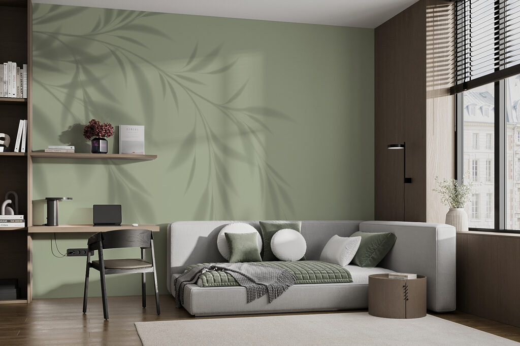 A shadow of a plant on a wall