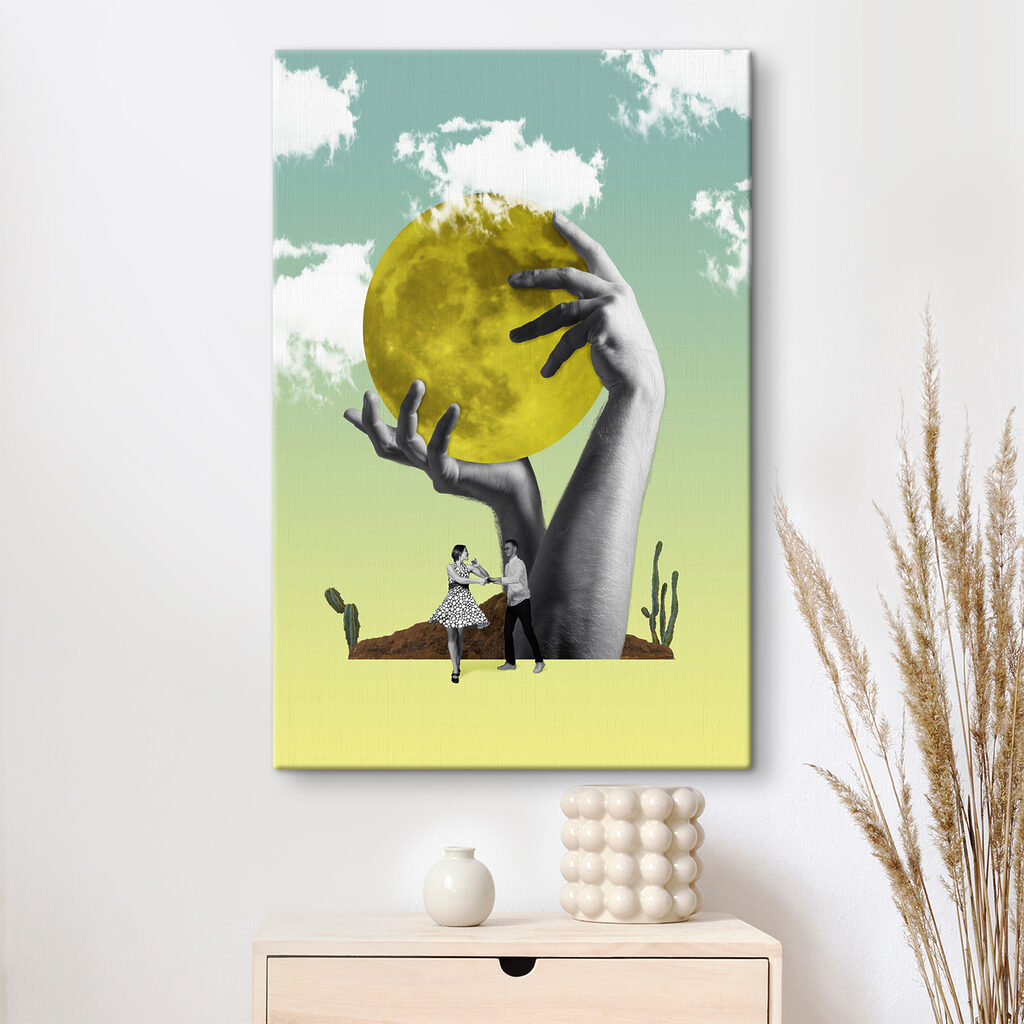 A man and woman holding a yellow moon
