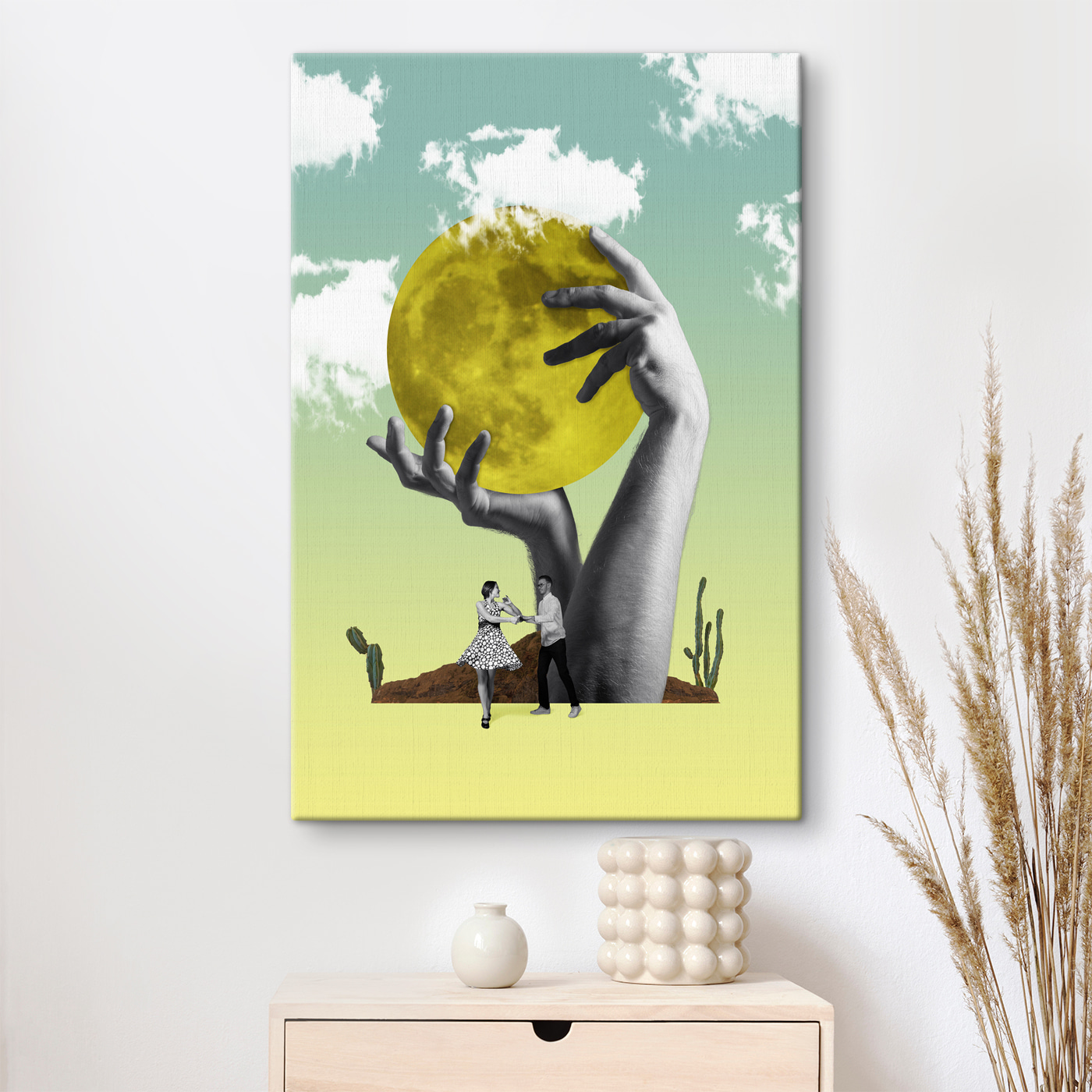 A man and woman holding a yellow moon