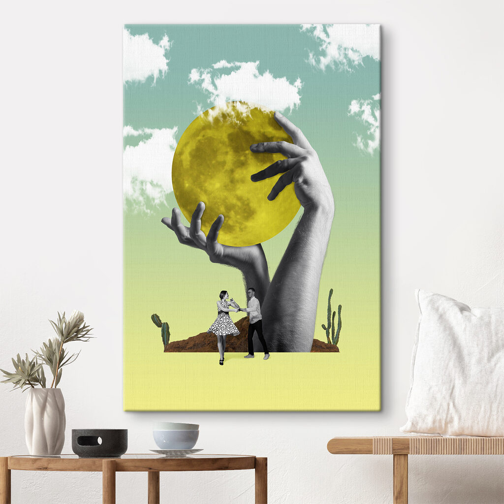 A man and woman holding a yellow moon