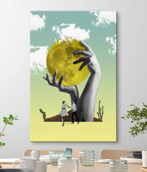 A man and woman holding a yellow moon