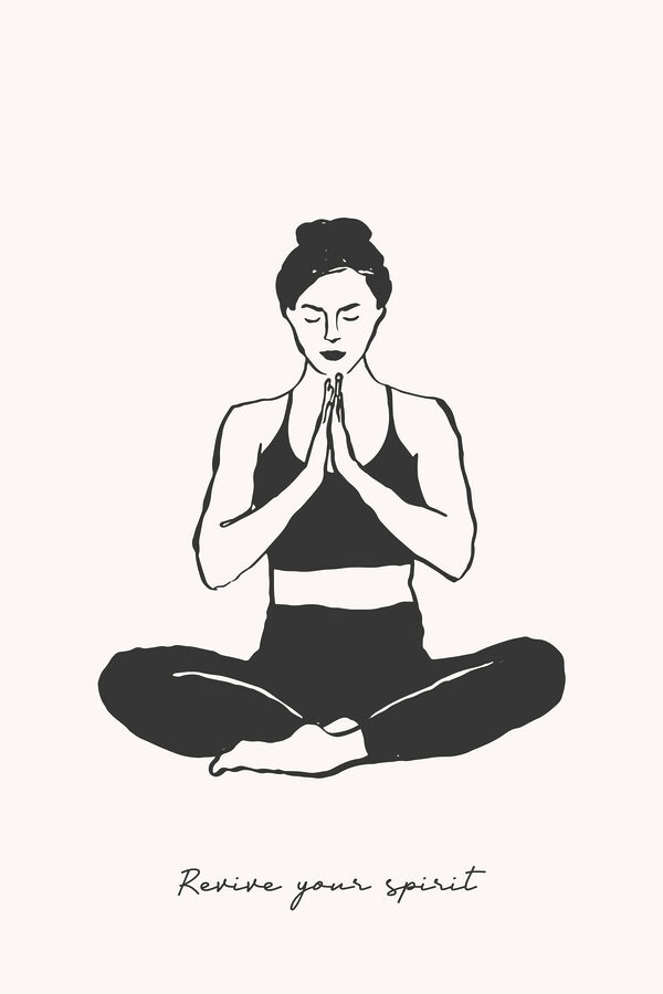 A woman sitting cross legged with her hands together A woman sitting cross legged with her hands together