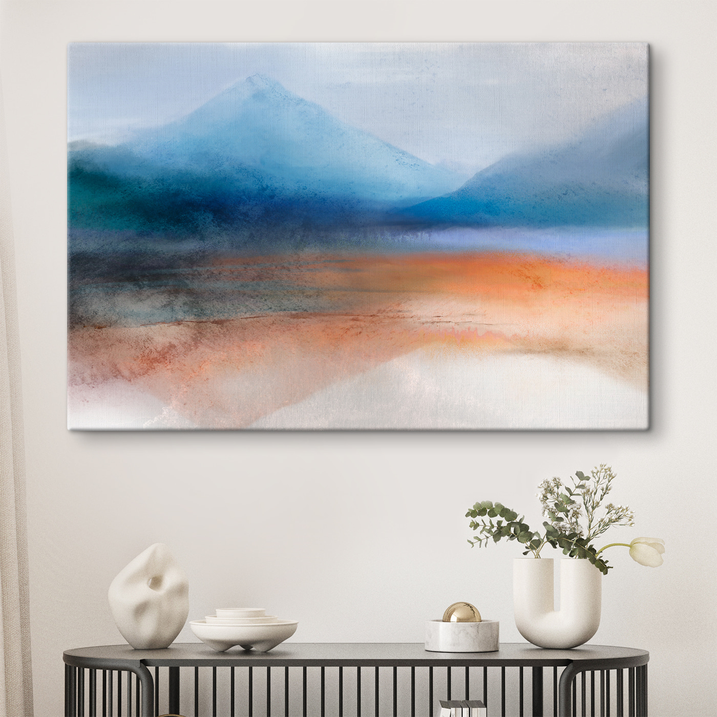 A watercolor painting of mountains and sand