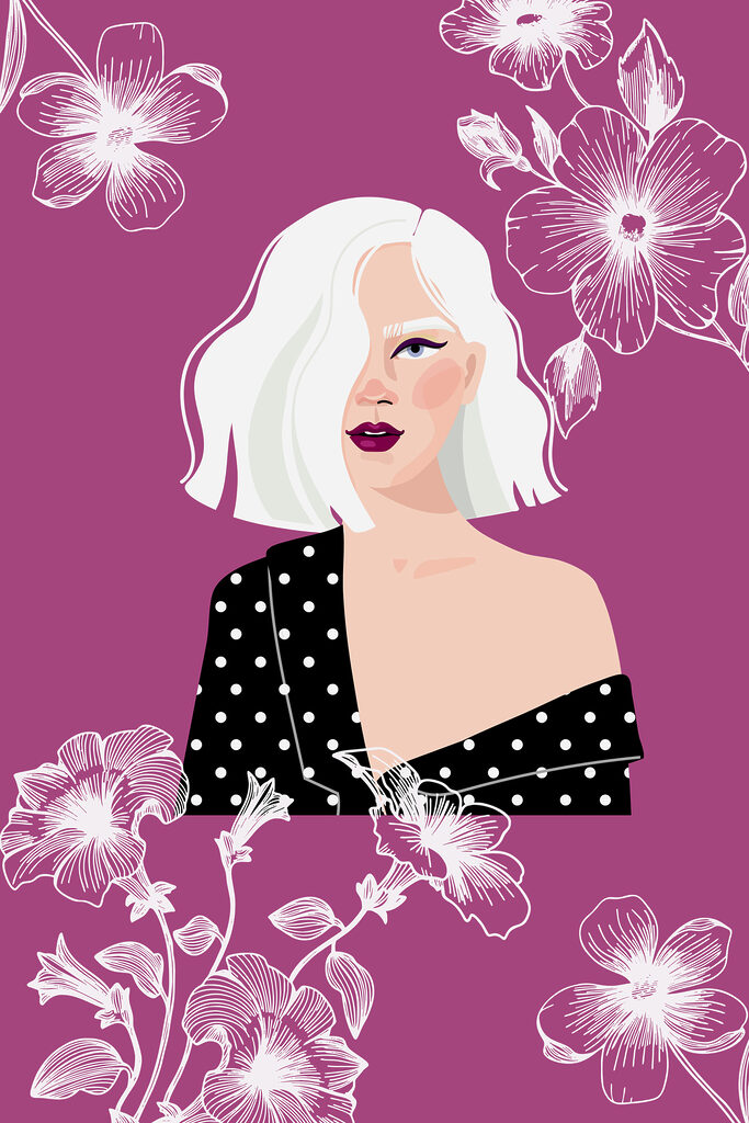 A woman with white hair and polka dot shirt