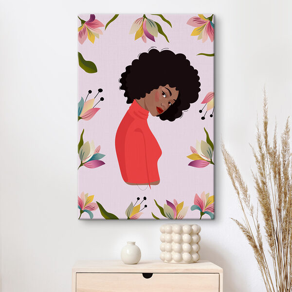 A woman with curly hair and flowers