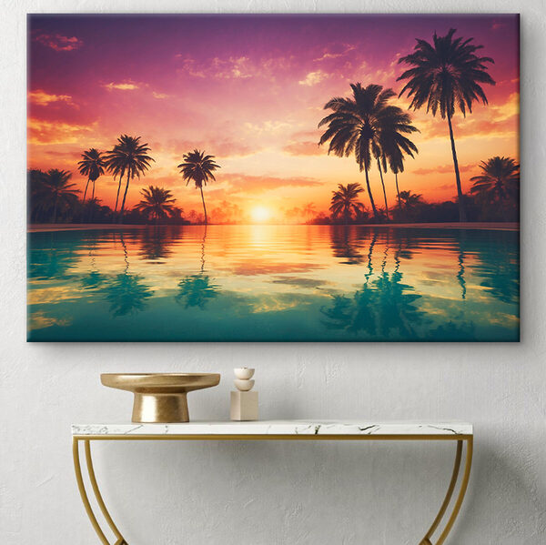 A sunset over a body of water with palm trees