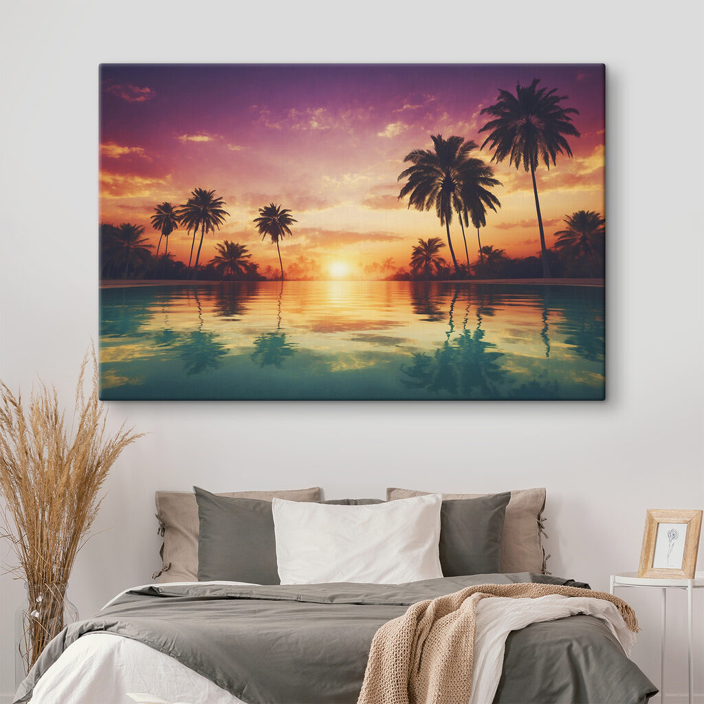 A sunset over a body of water with palm trees
