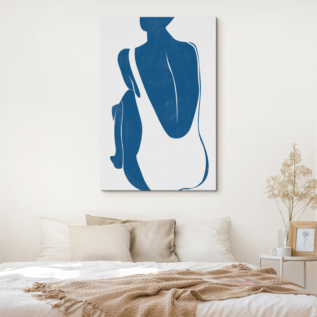 A blue and white silhouette of a woman and a penguin