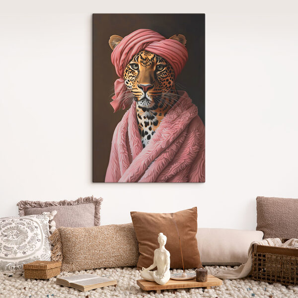 A leopard wearing a pink robe and a pink turban