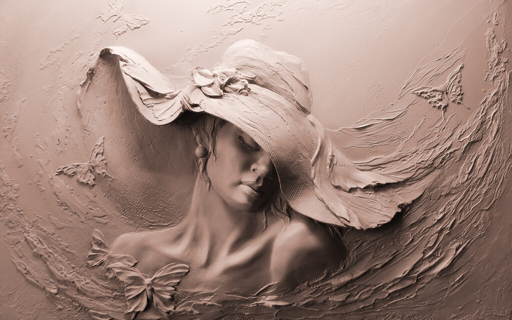 Una scultura di donna con cappello Una scultura di donna con cappello