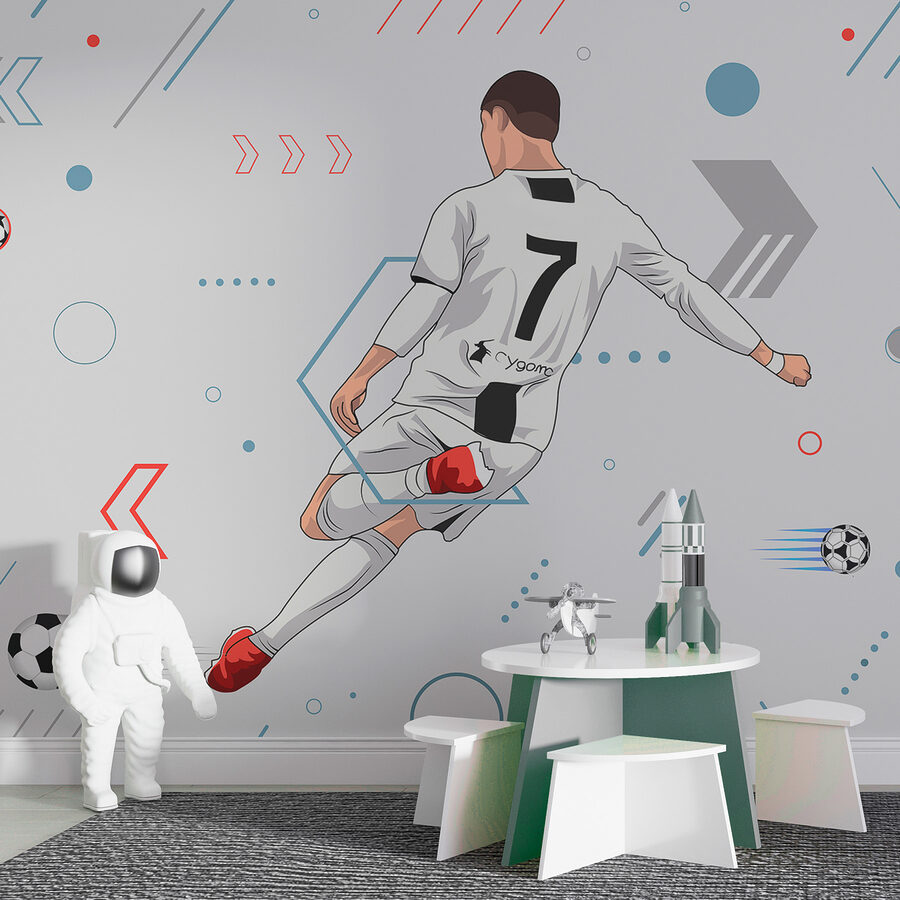 Un giocatore di calcio che calcia un pallone
