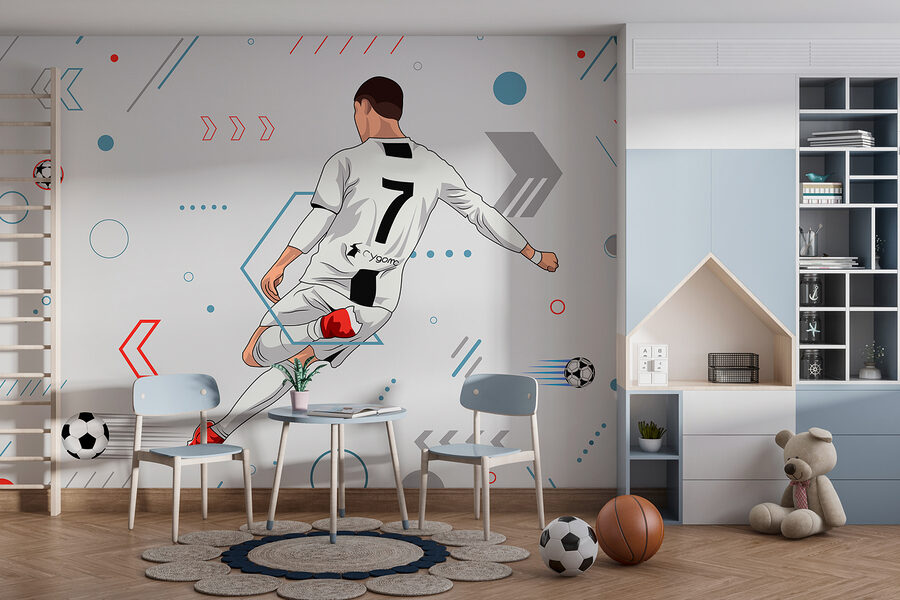 Un giocatore di calcio che calcia un pallone