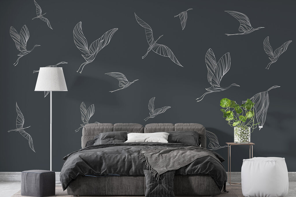 A group of birds flying A group of birds flying