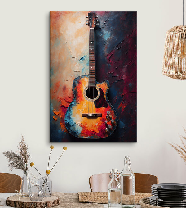 A guitar leaning against a wall