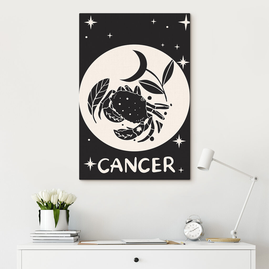 A black and white drawing of a crab and a plant