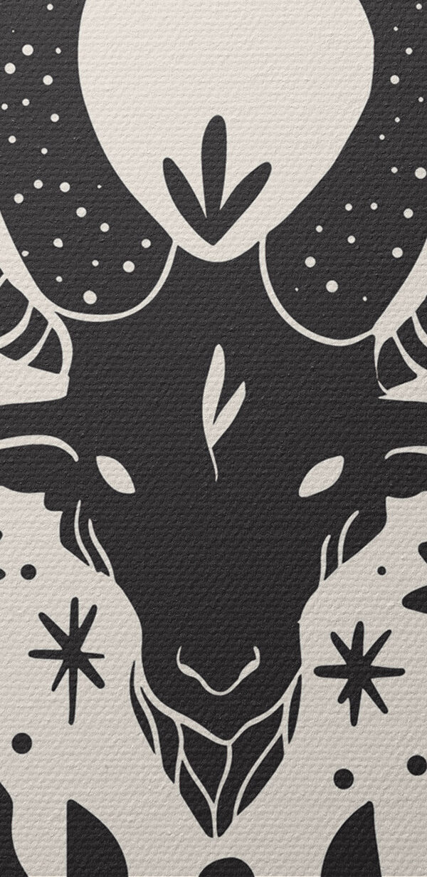 A black and white drawing of a goat with horns and leaves