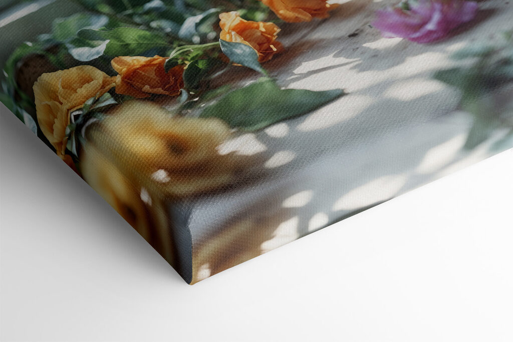 A vase of flowers on a window sill
