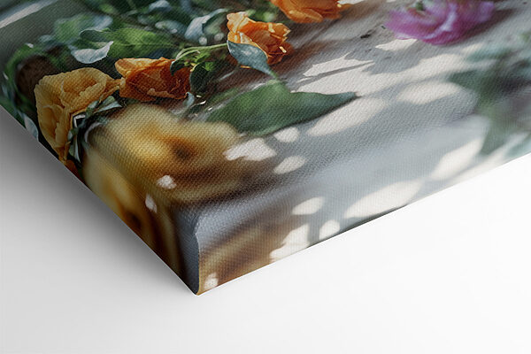A vase of flowers on a window sill