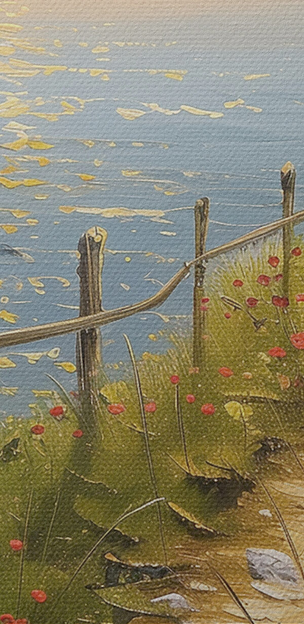 A path leading to a beach with red flowers
