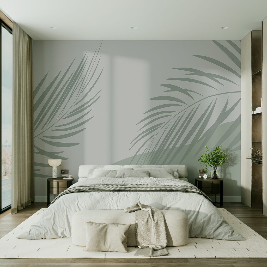 Palm leaves on a grey background