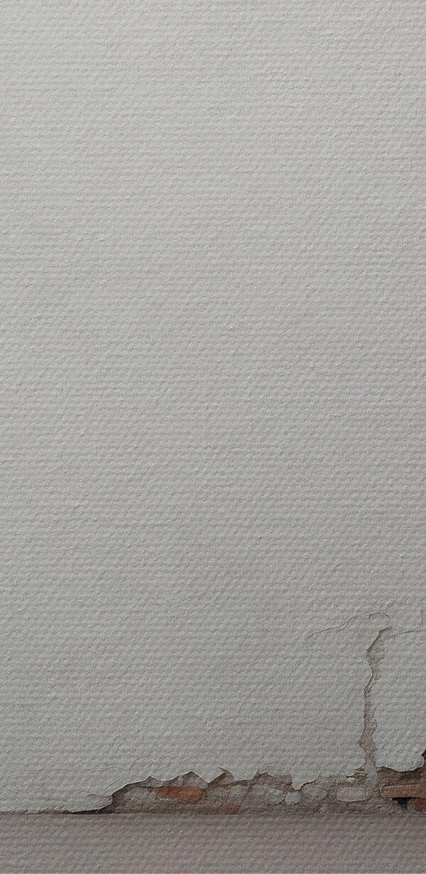 White wall with a crack in the wall White wall with a crack in the wall