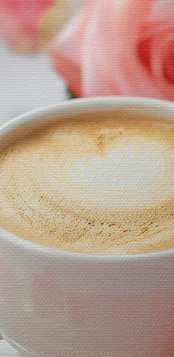Cup of coffee and pink roses