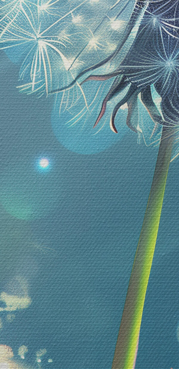 Dandelion with a blue sky and clouds