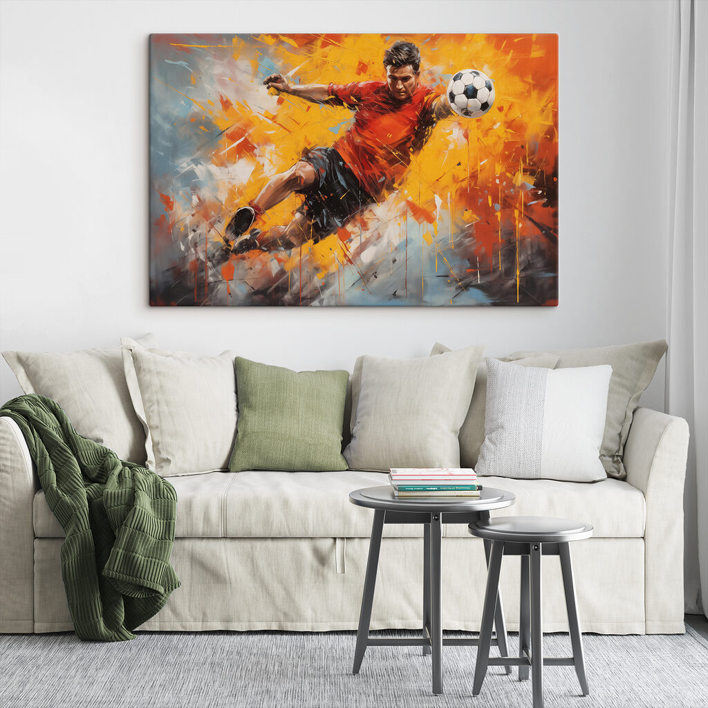 Man in a red shirt kicking a football ball