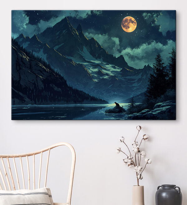 Cat sitting on a rock in front of a mountain lake Cat sitting on a rock in front of a mountain lake
