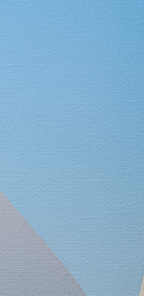 White building with a blue sky