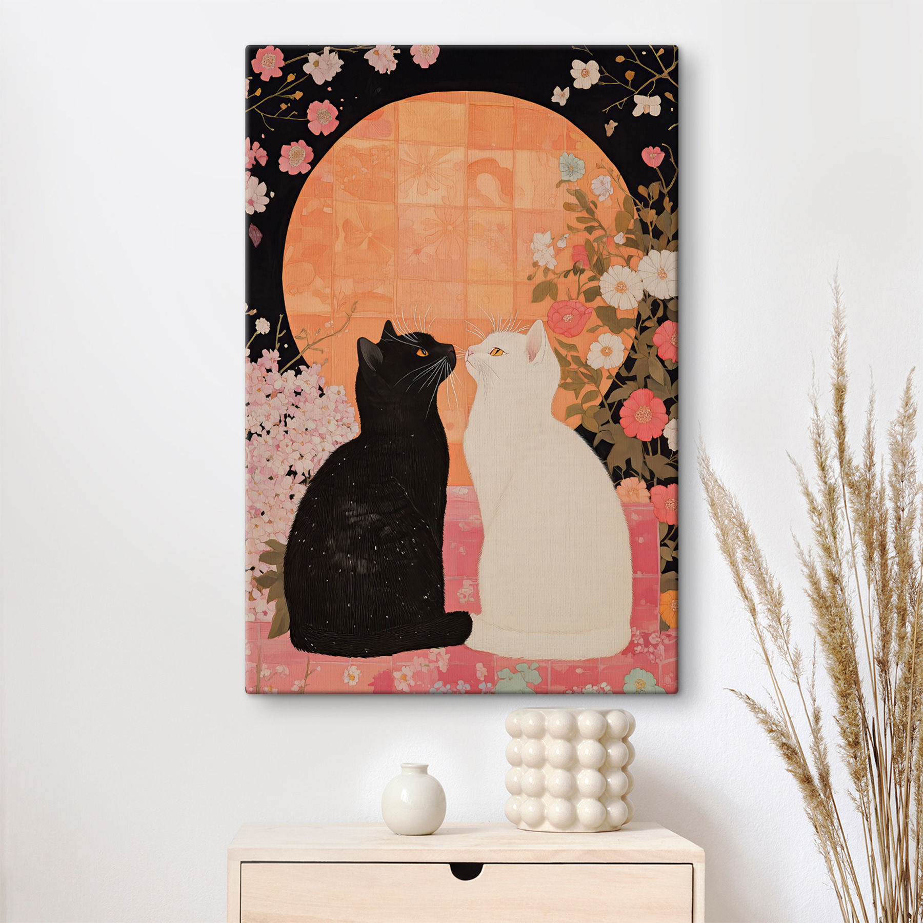 Black and white cats looking at each other
