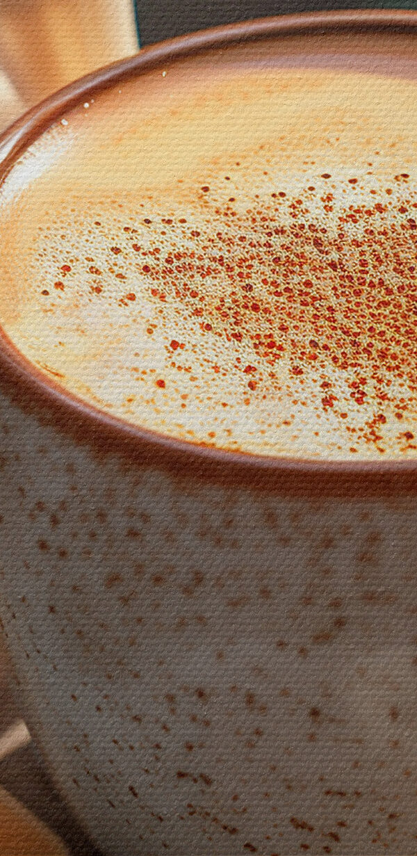 Coffee cup with a foamy foam on top of a wood stump with flowers