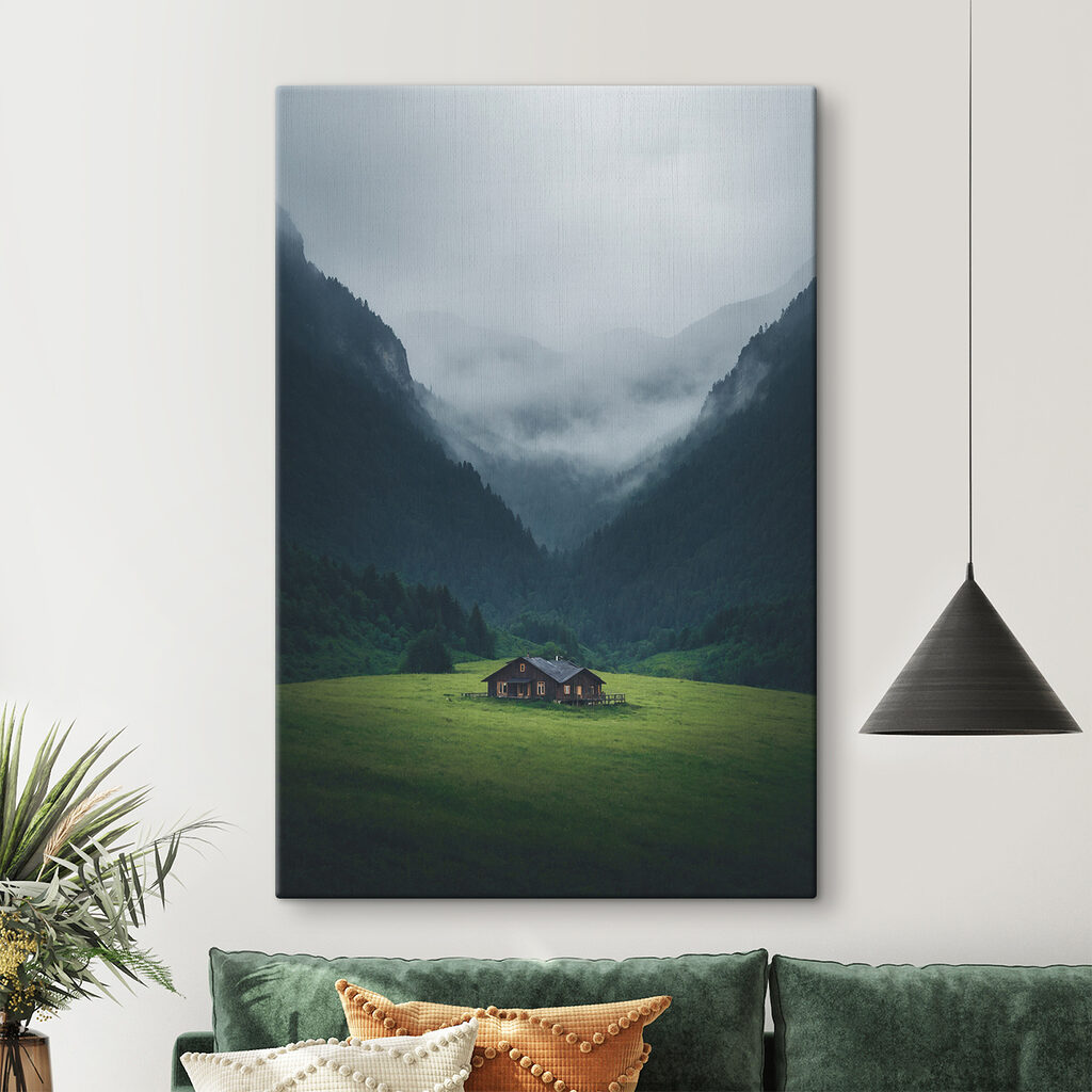 House in a field with mountains in the background House in a field with mountains in the background