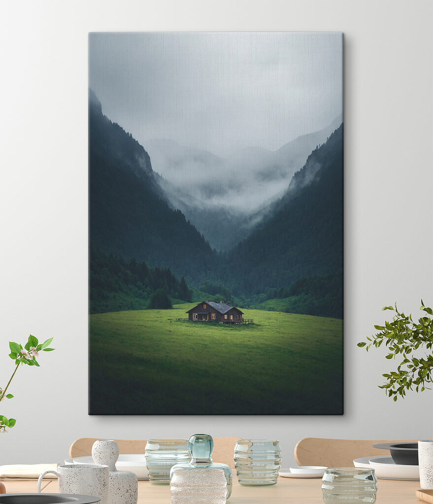 House in a field with mountains in the background House in a field with mountains in the background