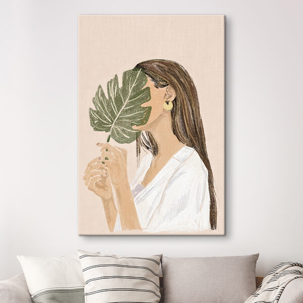 Woman holding a leaf
