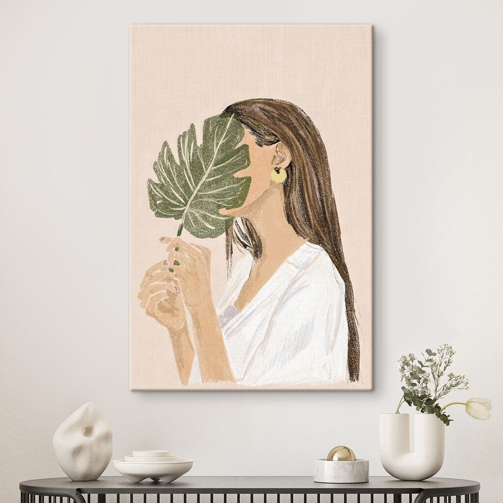 Woman holding a leaf