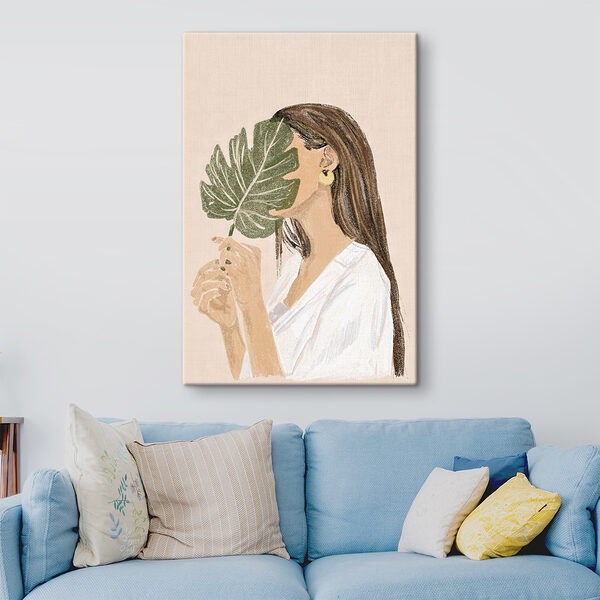 Woman holding a leaf