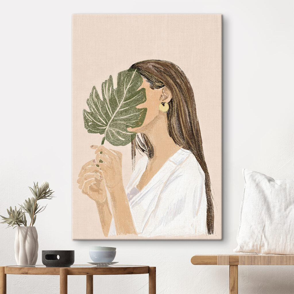 Woman holding a leaf