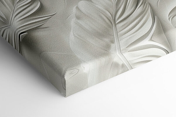 White feather carving on a wall White feather carving on a wall