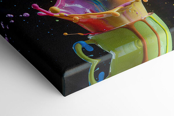 Colorful splashing liquid in a cup Colorful splashing liquid in a cup